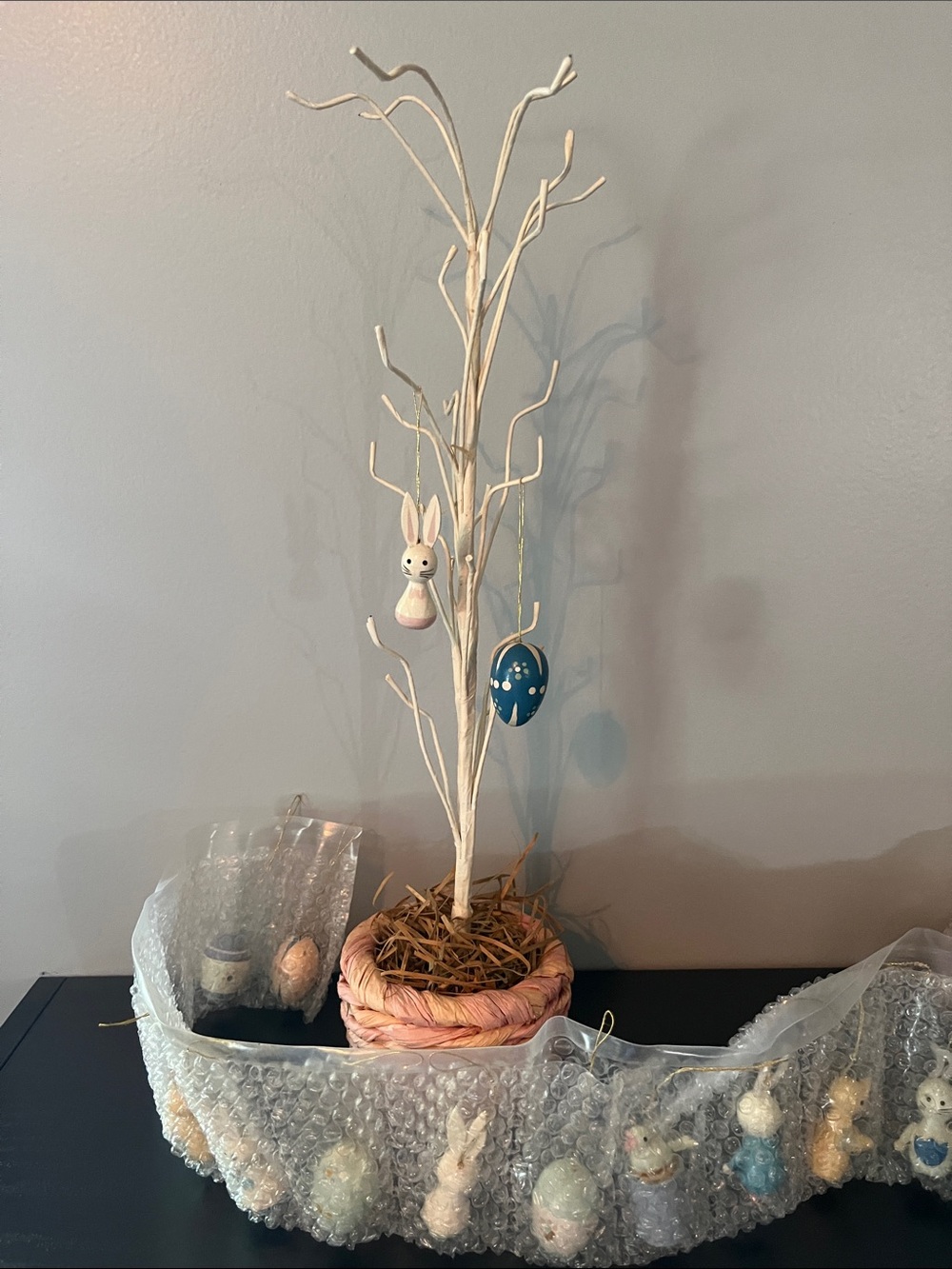 White Decorative Easter Branch with Pink Basket and 24 wooden ornaments